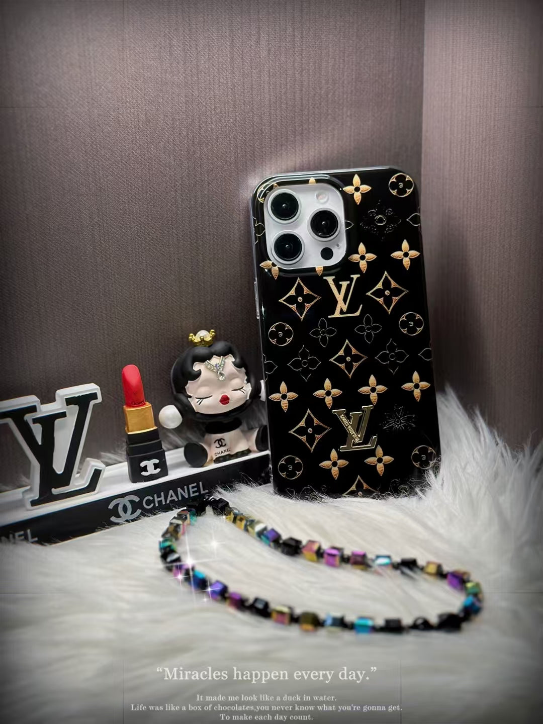 Luxury Black Monogram iPhone Case with Gold Accents and Charm Strap