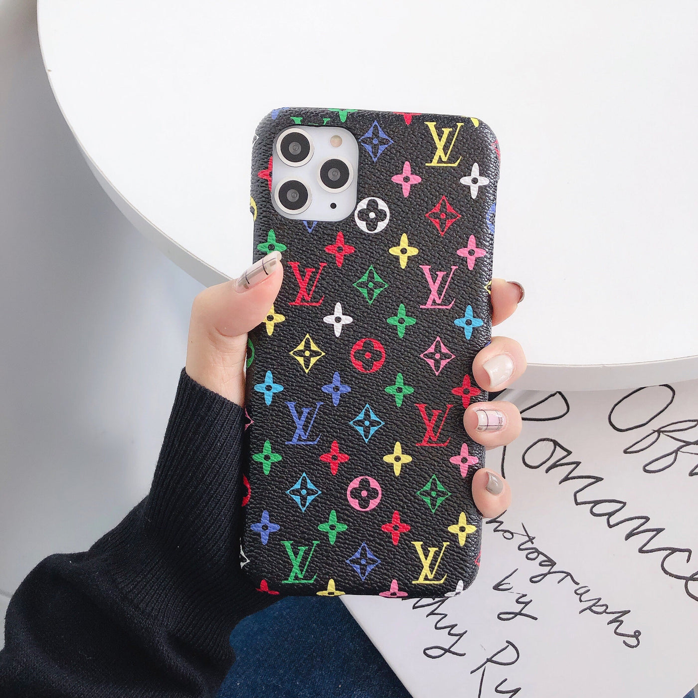 Iconic LV monogram and Supreme logo on Samsung phone case