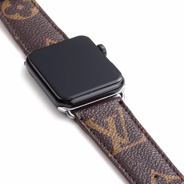 Classic brown LV monogram leather strap for Apple Watch.